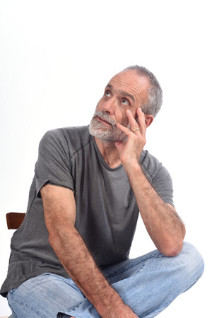 Portrait of a middle aged man sittingの写真素材