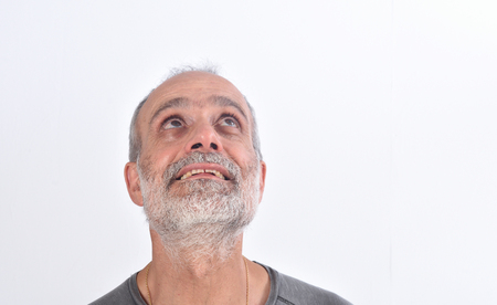 Portrait of a middle aged man looking upの写真素材