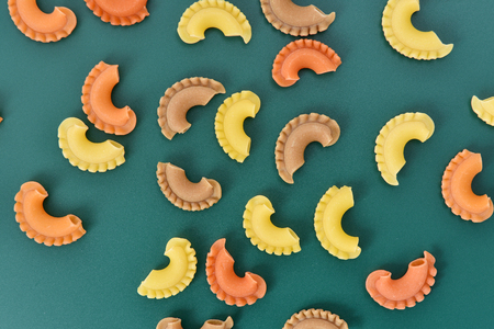 Pasta creste di gallo on green backgroundの写真素材