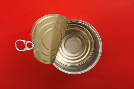 can isolated on red backgroundの写真素材