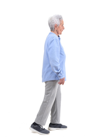 senior woman with sportsweare on white backgroundの写真素材