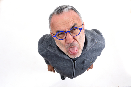 man making mockery on whiteの写真素材