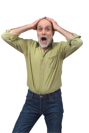 man with expression of forgetfulness or surprise on white backgroundの写真素材