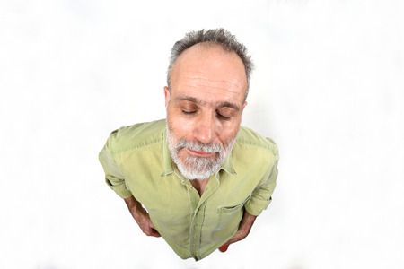 man with closed eyes on whiteの写真素材