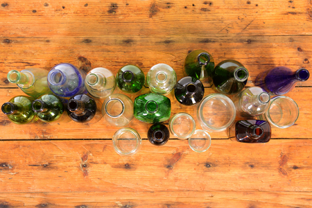 top view of bottles on table of woodの写真素材