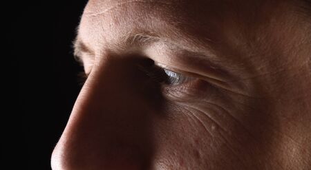 detail of the face of a man in his early thirtiesの写真素材
