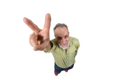 man making the victory sign on a white backgroundの写真素材