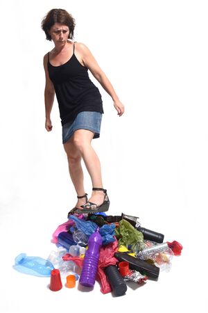 portrait of a angry woman with plastics in white backgroundの写真素材