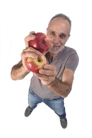 man with red apple on white backgroundの写真素材