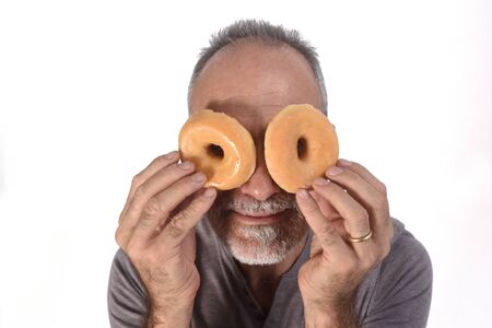 man with donut on white backgroundの写真素材
