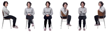 woman sitting on a chair on white backgroundの写真素材