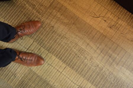 leather shoes on a wooden wooden floor,