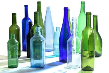 group of bottles scattered on a white backgroundの写真素材
