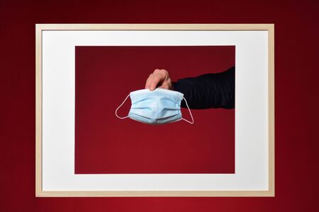 medical mask on red background