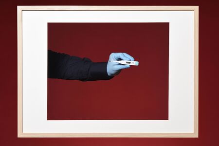 picture of thermometer on a red background