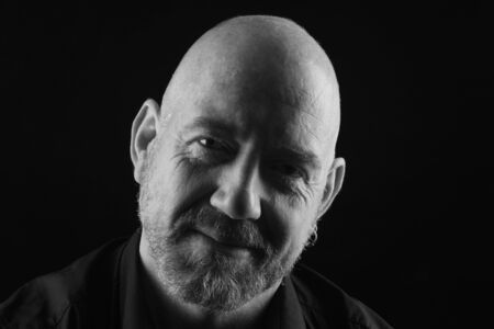 portrait of a man on black background,