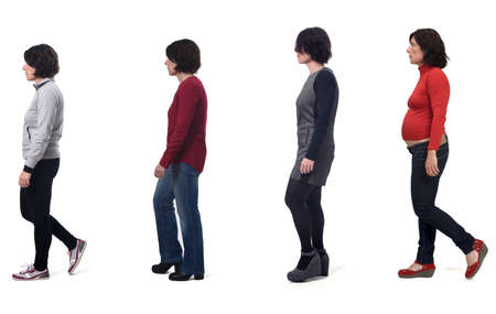 woman with various types of outfits and pregnant on white backgroundの写真素材