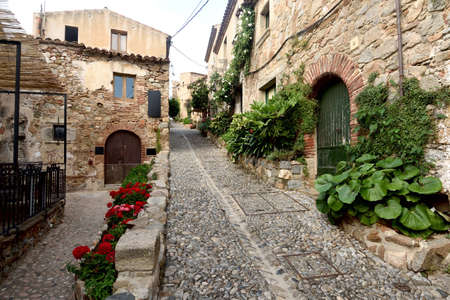 street of old town of Tossa de Mar, Girona province, Catalonia, Spainの写真素材