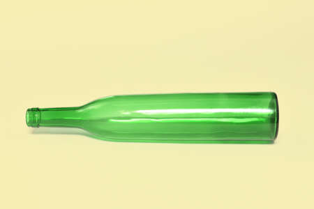 green glass bottle on a soft color backgroundの写真素材