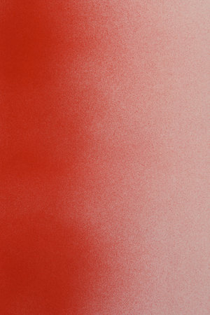spray paint red on white paper background