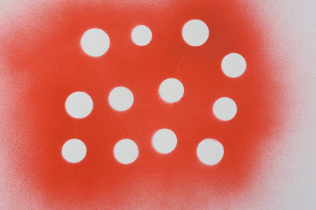spray polka dot on a paper backgroundの写真素材