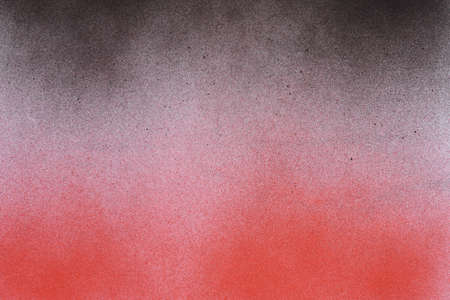 black and red spray paint on white paperの写真素材