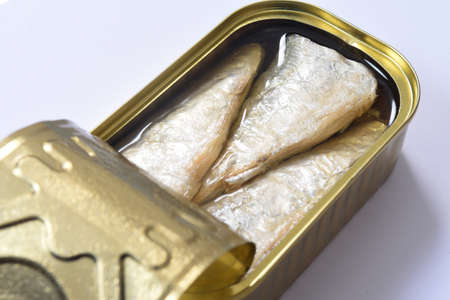 top view of a can of sardines on white background