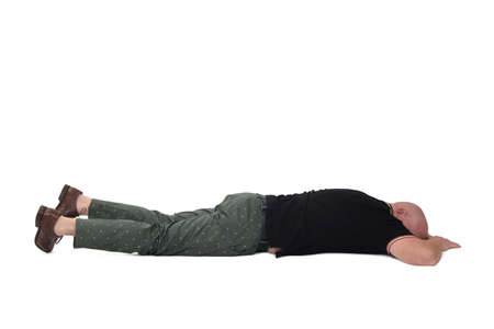 man lying on face down on white backgroundの写真素材