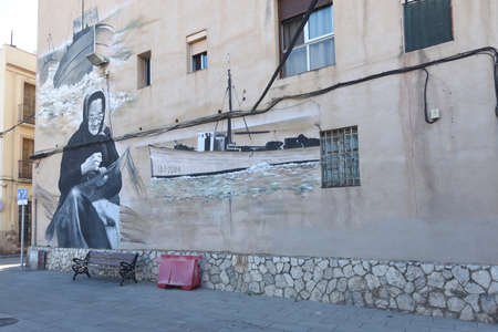 urban art in the fishing district of El Serrallo in Tarragona, Spainの写真素材