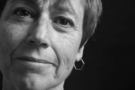 face of middle aged woman back and whiteの写真素材