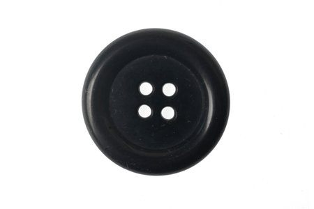 vintage button black isolated on white backgroundの写真素材