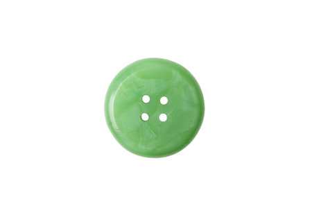 vintage button green isolated on white backgroundの写真素材