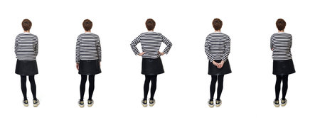 back view of various poses of same woman with skirt standing on white backgroundの写真素材
