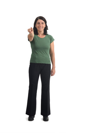 front view of a woman pointing to the front on white backgroundの写真素材