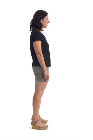 side view of a woman with shorts on white backgroundの写真素材