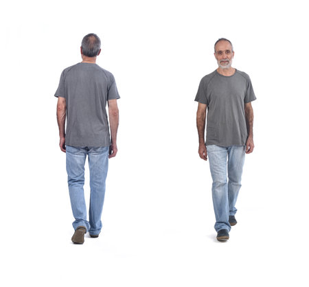 front and back view of same men walking on white backgroundの写真素材