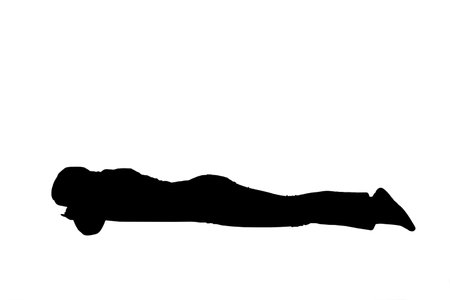 silhouette of young girl lying upside down on white backgroundの写真素材