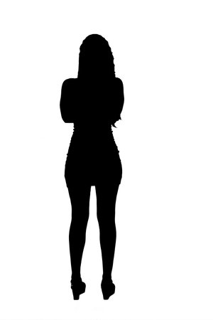 rear view silhouette of young girl standing and arms crossed dressed in short dress on white backgroundの写真素材