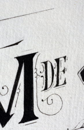 the letters made with nib on white paperの写真素材