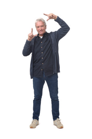 front view of a man framing with his hands on white backgroundの写真素材