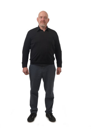 front view of a man looking at camera on white backgroundの写真素材
