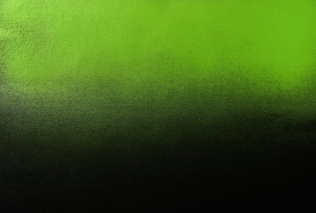 black paper with green spray paint