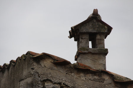 Typical old chimney on an old Croatian house, up close.の写真素材
