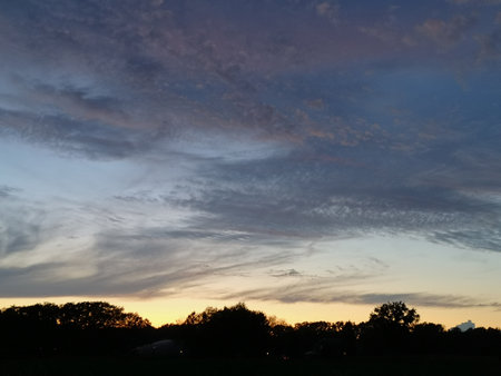 Cloudy sky in the evening twilight. Dark clouds.の写真素材