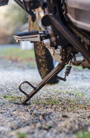 Close up of a motorcycle standing on his kickstandの写真素材