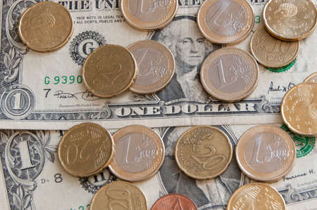 one dollar bill with eurosの写真素材