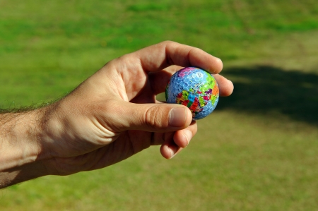 World Golf ball in handの写真素材
