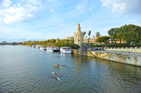 The Guadalquivir river passing through the city of Seville, Torre del Oro, Andalusia, Spainのeditorial素材