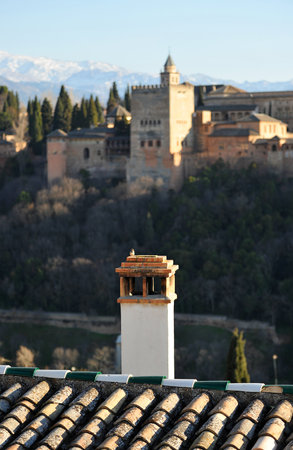 Roofs and chimneys of the Albaicin, Palace of the Alhambra in Granada viewed from the Mirador de San Nicolas, Granada, Andalusia, Spainのeditorial素材