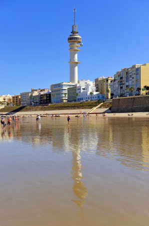 Sun and beach tourism, beach of Cadiz, Costa de la Luz, Andalusia, Spainのeditorial素材